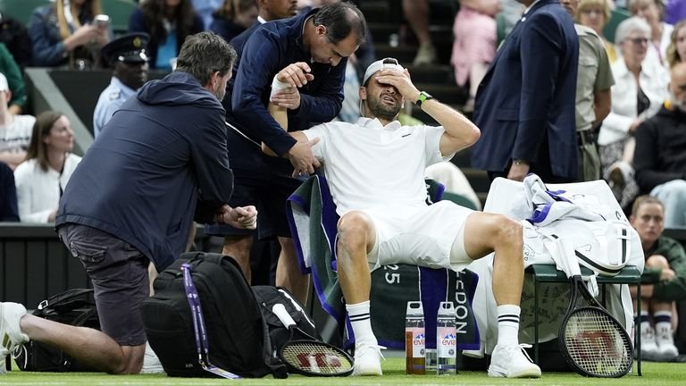 Grigor Dimitrov Grimases after suffering an injury in his fight against Jannik Sinner in Wimbledon on July 7, 2025
