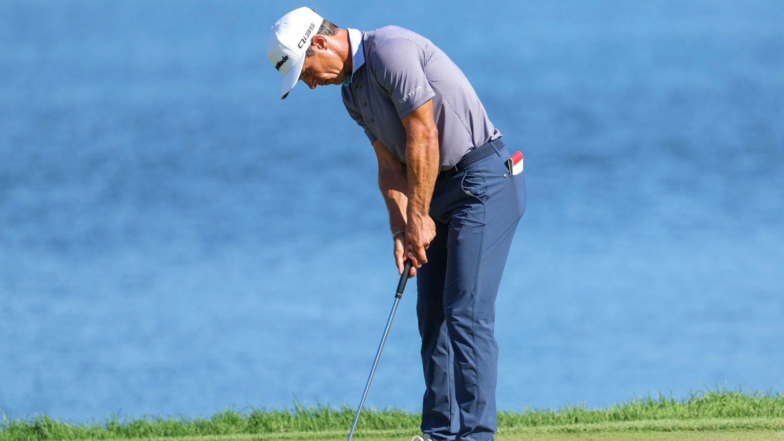 Thorbjorn Oleson putts on the eighteenth green during the third round of the 3M Open