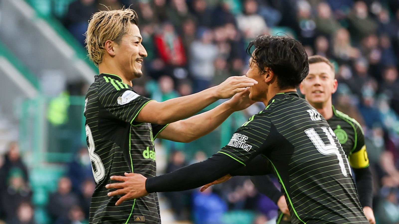 Daizen Maeda celebrates with Reo Hatate after scoring Celtic's opening goal against Hibs