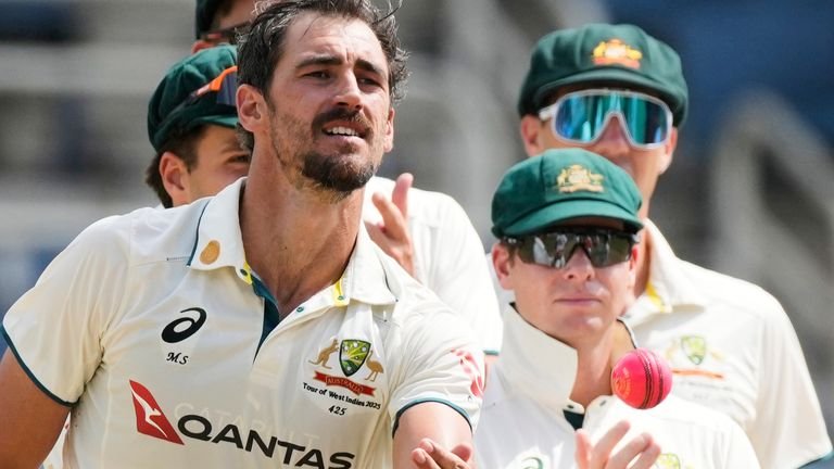 Australia's Mitchell Starc celebrates after dismissing West Indies' Mikyle Louis to claim his 400th wicket in Test cricket