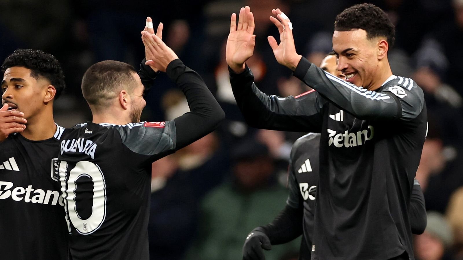 Morgan Rogers celebrates with Emi Buendia after scoring Aston Villa's second goal at Spurs
