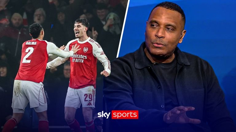 Arsenal's Kai Havertz, right, celebrates with Arsenal's William Saliba after scoring the opening goal during the English League Cup semi-final second leg soccer match between Arsenal and Chelsea in London, Tuesday, Feb. 3, 2026.