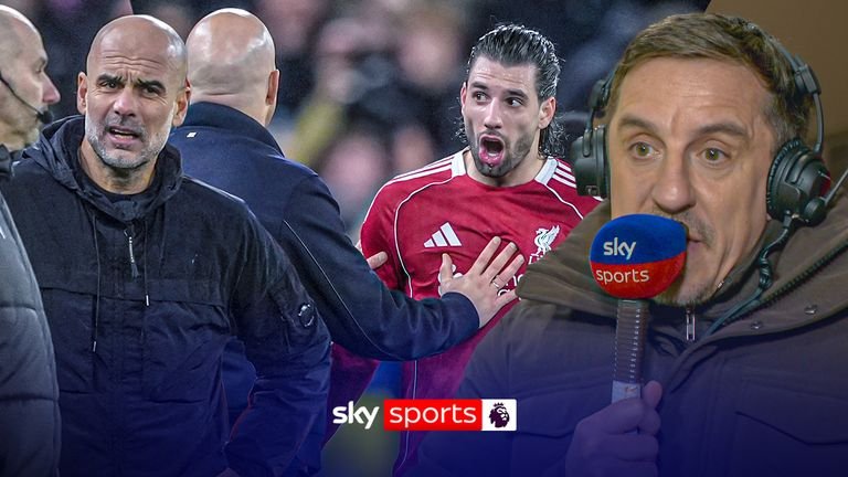 Neville speaks at the end of the match.