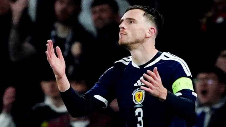 Andy Robertson conceded a penalty for a foul on the edge of the area that allowed Denmark to level at 1–1 