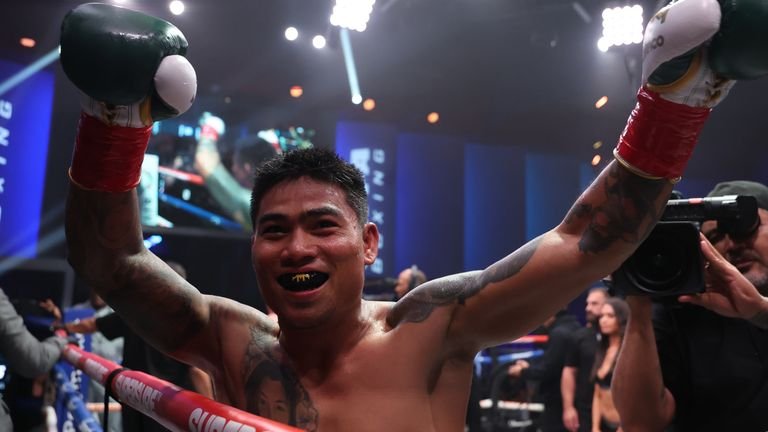 Mark Magsayo celebrates victory over Feargal McCrory at Zuffa 05