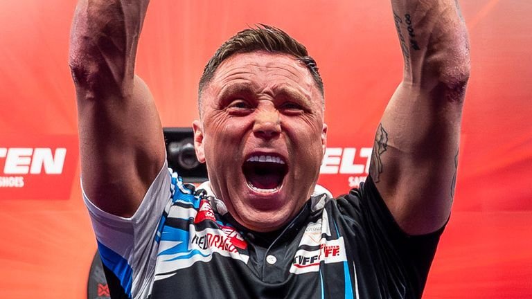 Gerwyn Price celebrates his victory at the European Darts Grand Prix
