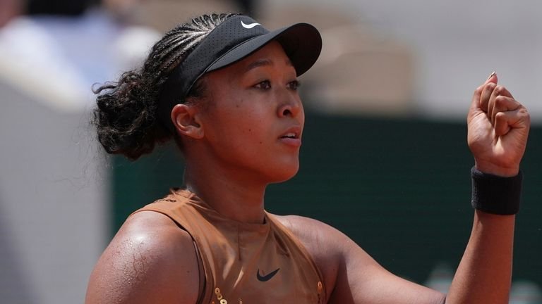 Naomi Osaka of Japan celebrates winning her third round women's singles tennis match against Iva Jovic of the United States at the French Open tennis tournament in Paris, Saturday, May 30, 2026. (AP Photo/Thibault Camus)